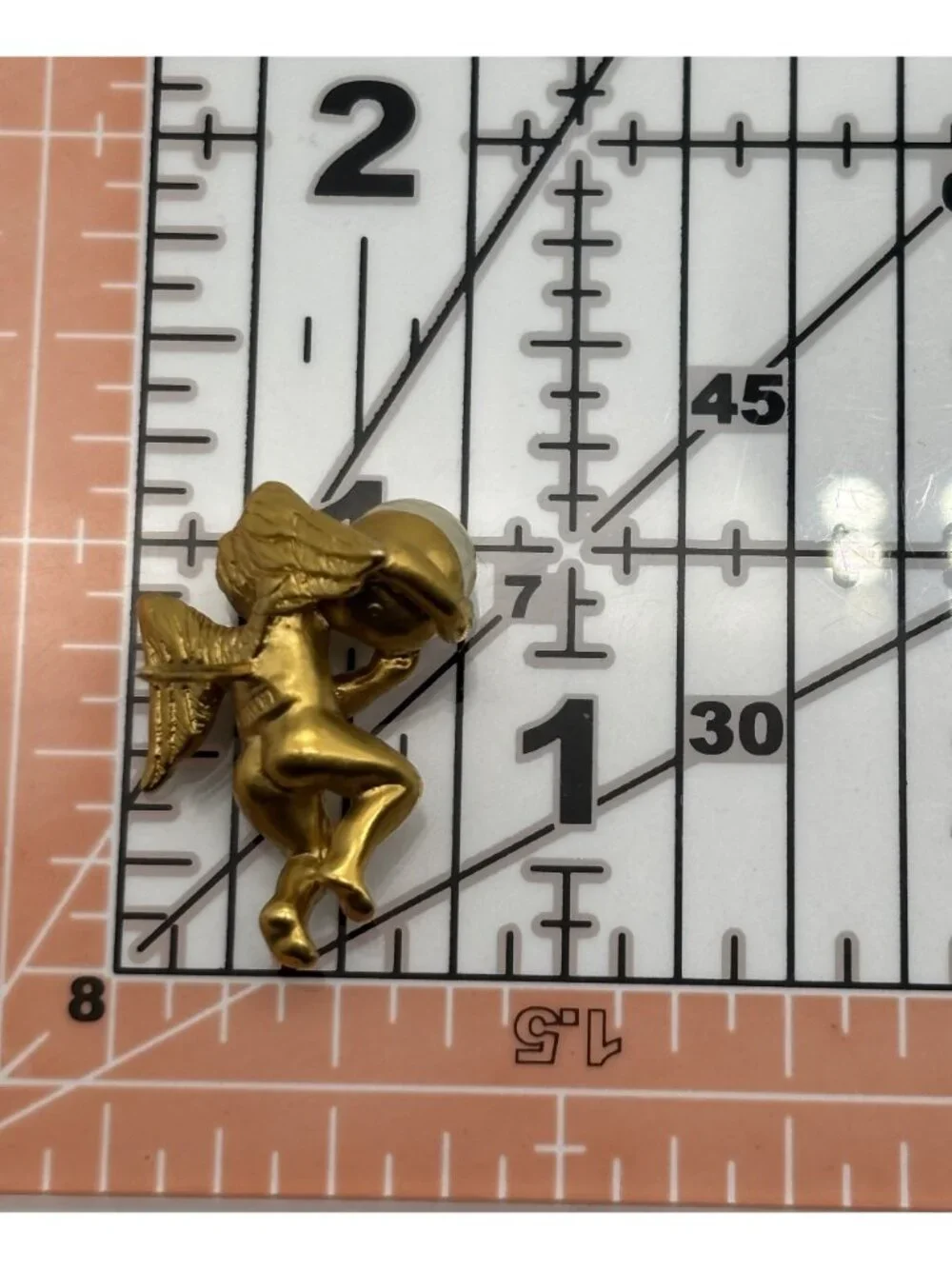 Vintage Avon Angel Cherub Holding Faux Pearl Lapel Pin Matte Gold Tone 3D Signed